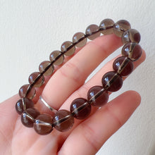 Load image into Gallery viewer, Stone of Health | Smoky Quartz Crystal Bracelet Handmade with High-quality 10mm Round Beads | Men&#39;s Women&#39;s Healing Crystal Jewelry
