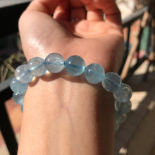 Load image into Gallery viewer, 10.5mm Aquamarine Bracelet Throat Chakra Activation March Birthstone Pisces
